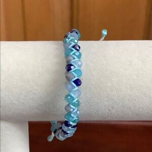Handmade shades of blue beads adjustable nylon bracelet